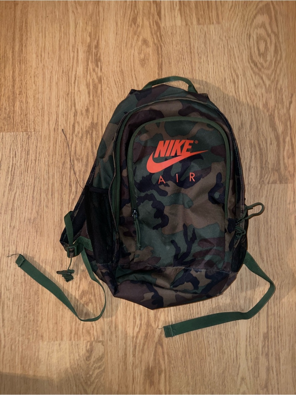Nike Camouflage Backpack with Orange Logo